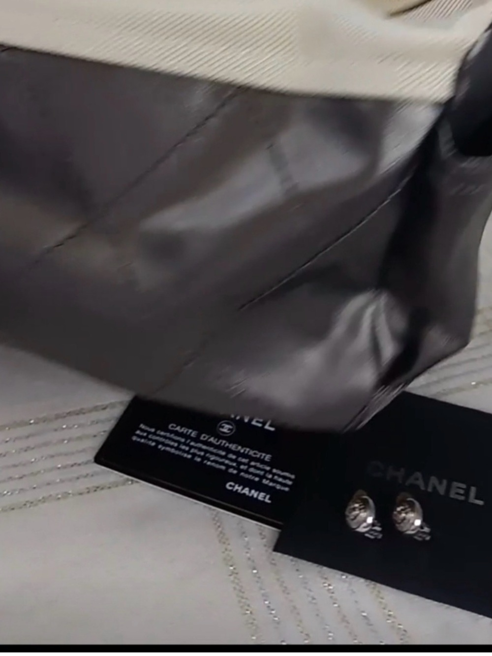 CHANEL Metallic Silver and Cream Quilted Leather Shoulder Bag &
CHANEL EARRINGS - Picture 2 of 13